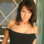 Kaydin in a hot red & black skirt outside