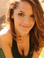 Brittanys works up a sweat in the backyard exercising topless