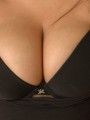 Teen with huge tits popping out of her bra