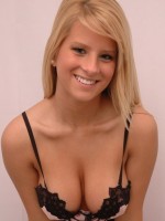 Busty Kimmy bends over and shows off her massive real teenage tits